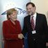 A chanceleresa alem&aacute;, Angela Merkel, e o presidente do PP espa&ntilde;ol, Mariano Rajoy, esta cuarta feira en Varsovia